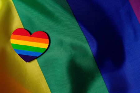 LGBT pride flag with the heart coloured in the LGBT pride colours. Concept of the Valentine day, freedom, equalityの写真素材