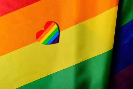 LGBT pride flag with the heart coloured in the LGBT pride colours. Concept of the Valentine day, freedom, equalityの写真素材