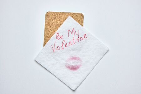 top view of valentine letter with smudged kiss isolated on white backgroundの写真素材