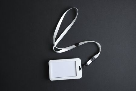 Security Badge on black background, event invitation concept, job