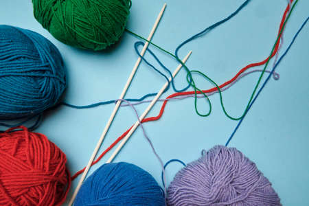 Group of various yarn balls and knitting needles closeupの写真素材