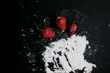 Kitchen table with products, top view. Strawberry and flour. Top view in frame only ingredients.の写真素材