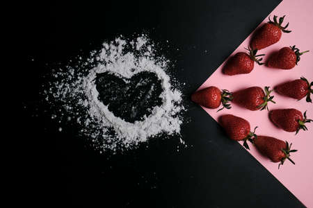 Kitchen table with products, top view. Strawberry and flour. Top view in frame only ingredients.の写真素材