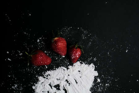 Kitchen table with products, top view. Strawberry and flour. Top view in frame only ingredientsの写真素材
