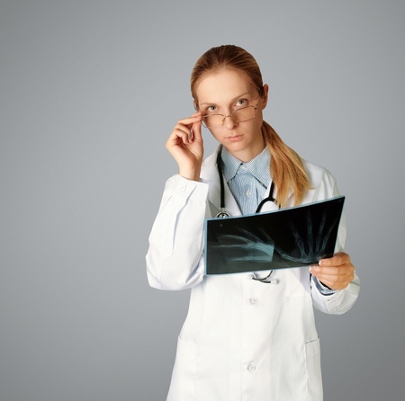 doctor woman with x-ray picture isolated on different backgrounds