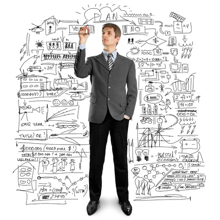 male writing something on glass board with markerの写真素材