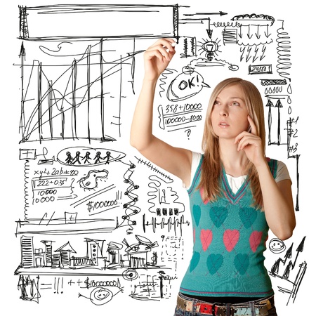 female writing something on glass board with markerの写真素材