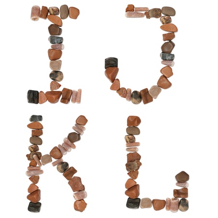 collection of letters woth clipping path of ocean stones close-upの写真素材