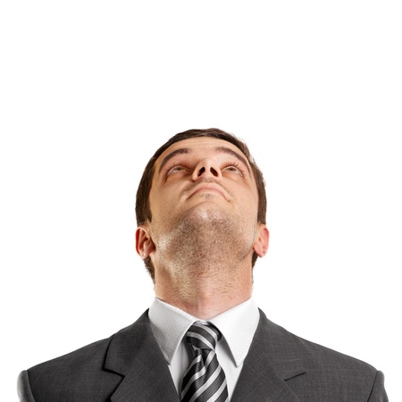 idea concept with businessman looking upwards, with suit and necktie idea concept with businessman looking upwards, with suit and necktie