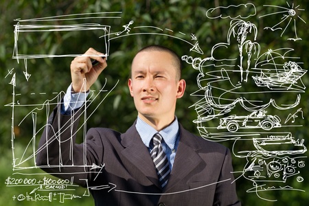 Idea concept, man writing something outdoorsのeditorial素材