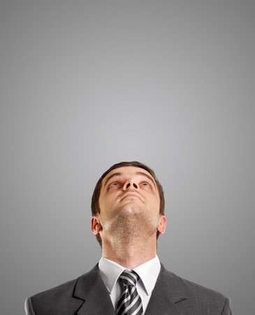 idea concept with businessman looking upwards, with suit and necktieのeditorial素材