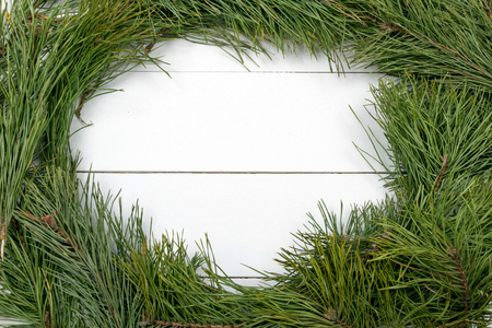 Christmas Greeting Card. Fir Branch And Decoration On Plank. Christmas Fir Tree On Wooden Background. Copy Spaceの写真素材
