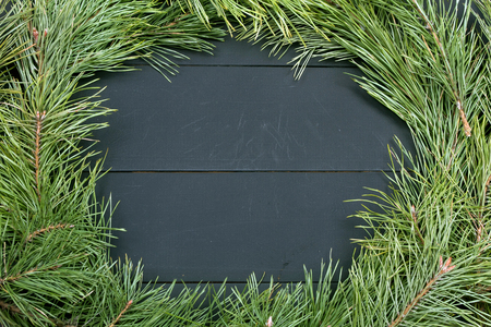 Christmas Greeting Card. Fir Branch And Decoration On Plank. Christmas Fir Tree On Wooden Background. Copy Spaceの写真素材