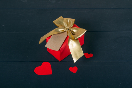 Gift boxes on wooden table. Gift image suitable for Valentines Day, Christmas, New Year or Birthday. With copyspaceの写真素材
