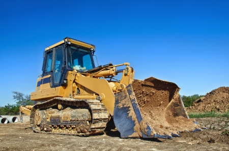 Yellow construction bulldozerの写真素材