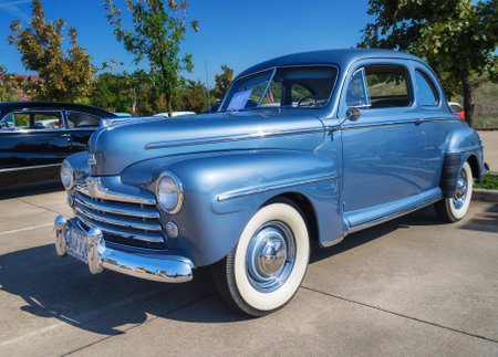 WESTLAKE, TEXAS - OCTOBER 18, 2014: A blue 1948 Ford Super Deluxe Coupe is on display at the 4th Annual Westlake Classic Car Show. Front side view.のeditorial素材
