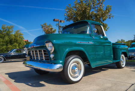 WESTLAKE, TEXAS - OCTOBER 18, 2014: A green 1956 Chevrolet 3100 pickup truck is on display at the...