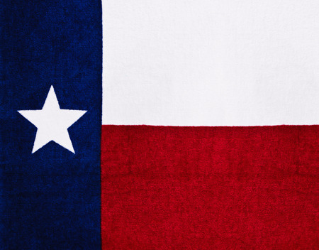 Flag of Texas on textured fabricの写真素材