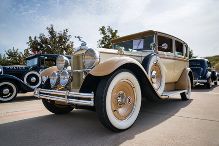 WESTLAKE, TEXAS - OCTOBER 17, 2015: A brown and yellow 1930 Packard Model 726 Sedan classic car.のeditorial素材