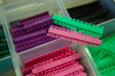 Colorful of rubber, orthodontic braces on teeth