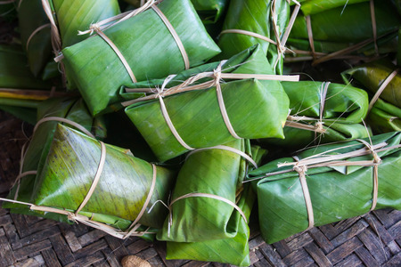 Glutinous rice with banana and banana leaf, Khao Tom Mudの写真素材
