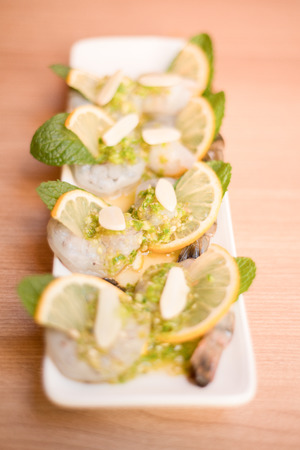 Raw prawn with seafood sauceの写真素材