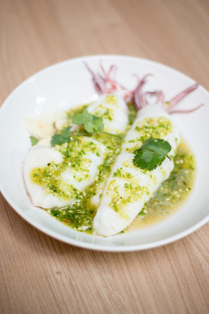 Squid with seafood dressingの写真素材