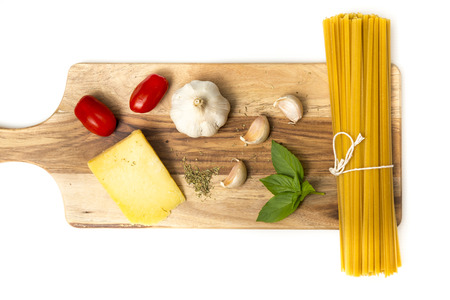 Raw spaghetti with fresh ingredientsの写真素材