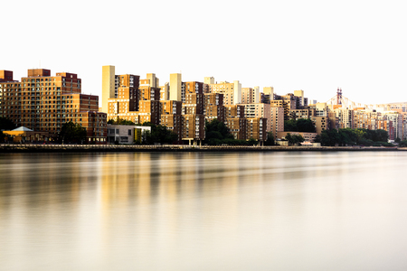 Roosevelt Island, New York skyline viewed from Carl Shurz Park, using slow shutter speed