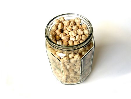 Chick Peas in Big Bottle on a White Background          の写真素材