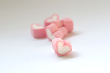 Heart shape marshmallow with on backgroundの写真素材