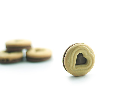 Heart shaped cookie isolated on white background