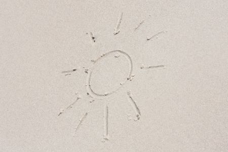 A sun symbol in the sandの写真素材