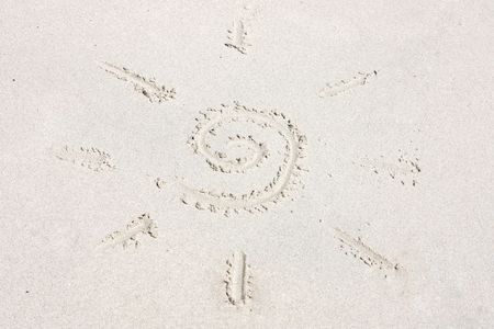 A sun symbol in the sandの写真素材
