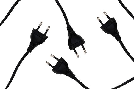 Black european power cords isolated on whiteの写真素材