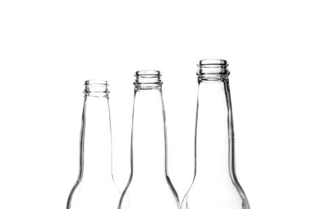 Three beer bottle necks on whiteの写真素材