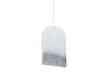 A tea bag isolated on whiteの写真素材
