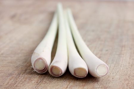 Lemon grass isolated on a wooden bgの写真素材