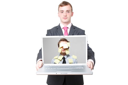 Business man with a laptopの写真素材