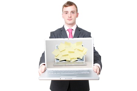 Business man with a laptopの写真素材