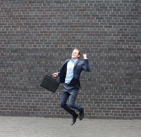 Business man jumpingの写真素材