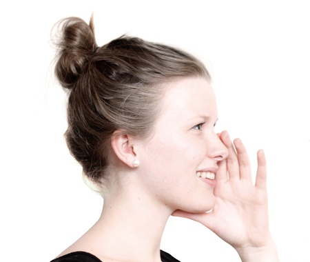 A girl whisperingの写真素材