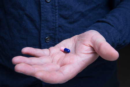 Pill in palmの写真素材