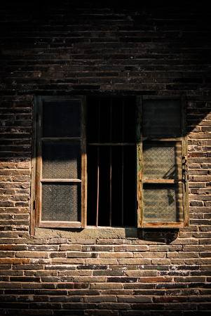 Window on old brick wallの写真素材