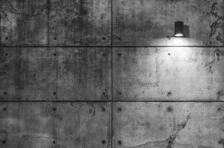 Grungy concrete wall and lightの写真素材