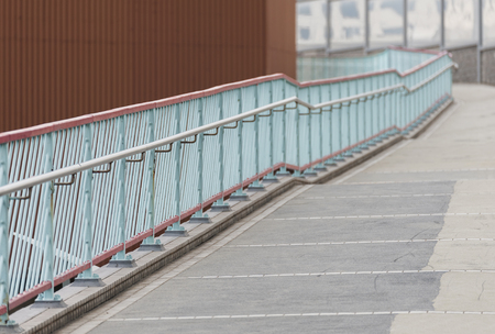 empty pedestrian walkway with bannisterの写真素材