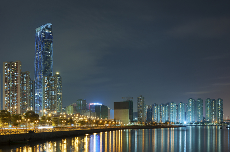 Harbor of Hong Kong city at nightの写真素材