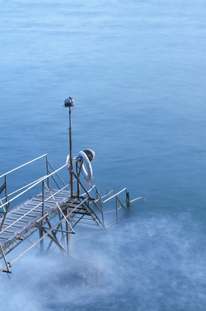 wooden jetty at duskの写真素材