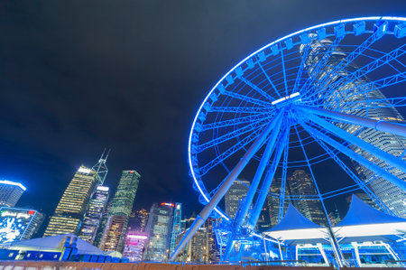 Ferris Wheel in Hong Kong City at nightのeditorial素材
