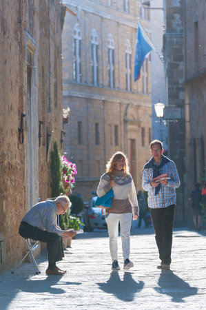 Pienza, Italy - May 13, 2014: tourist in historical village Pienza, Tuscany, Italy.のeditorial素材